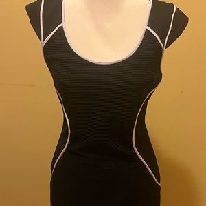 Black dress with white piping. Sleeveless. NWT